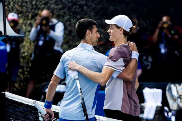 MELBOURNE, VIC - JANUARY 26: Jannik Sinner of Italy meets Novak Djokovic of Serbia at the net after winning his match during the semifinals of the 2024 Australian Open on January 26 2024, at Melbourne Park in Melbourne, Australia. (Photo by Jason Heidrich Icon Sportswire) TENNIS: JAN 26 Australian Open EDITORIAL USE ONLY Icon240126004