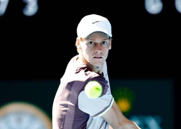 (240126) -- MELBOURNE, Jan. 26, 2024 -- Jannik Sinner of Italy eyes the ball during his men s singles semifinal against Novak Djokovic of Serbia at Australian Open tennis tournament in Melbourne, Australia, Jan. 26, 2024. (Photo by Xinhua) (SP)AUSTRALIA-MELBOURNE-TENNIS-AUSTRALIAN OPEN-MEN S SINGLES SEMIFINALS ChuxChen 