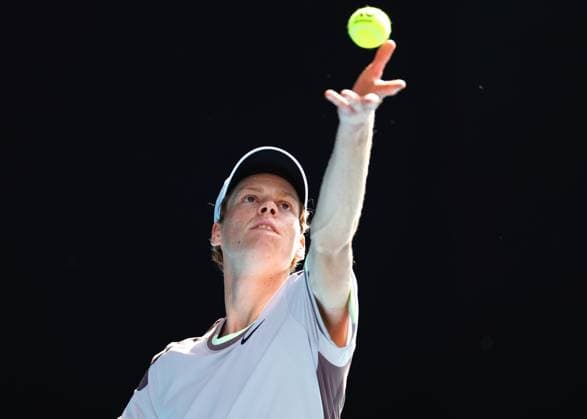 (240126) -- MELBOURNE, Jan. 26, 2024 -- Jannik Sinner of Italy serves during his men s singles semifinal against Novak Djokovic of Serbia at Australian Open tennis tournament in Melbourne, Australia, Jan. 26, 2024. (Photo by Xinhua) (SP)AUSTRALIA-MELBOURNE-TENNIS-AUSTRALIAN OPEN-MEN S SINGLES SEMIFINALS ChuxChen 