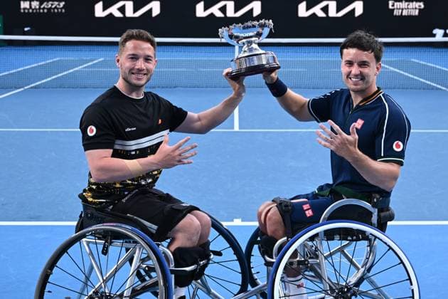 TENNIS AUSTRALIAN OPEN, Alfie Hewett and Gordon Reid of United Kingdom hold the trophy following their Men?s Wheelchair Doubles final win over Takuya Miki and Tokito Oda of Japan on Day 13 of the 2024 Australian Open at Melbourne Park in Melbourne, Friday, January 26, 2024. ( NO ARCHIVING, EDITORIAL USE ONLY, NO USE IN BOOKS WITHOUT CONSENT MELBOURNE VICTORIA AUSTRALIA  Copyright: xJOELxCARRETTx 20240126001893811611