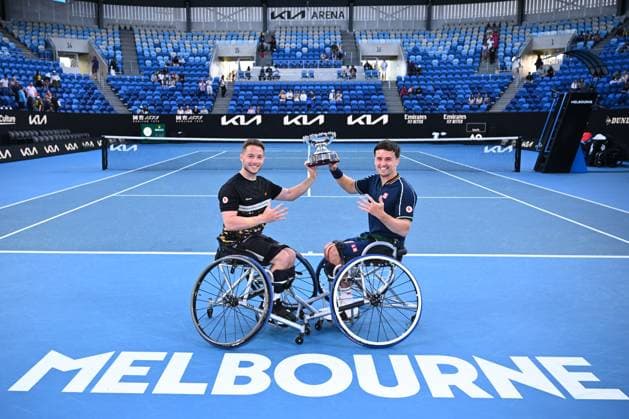 TENNIS AUSTRALIAN OPEN, Alfie Hewett and Gordon Reid of United Kingdom hold the trophy following their Men?s Wheelchair Doubles final win over Takuya Miki and Tokito Oda of Japan on Day 13 of the 2024 Australian Open at Melbourne Park in Melbourne, Friday, January 26, 2024. ( NO ARCHIVING, EDITORIAL USE ONLY, NO USE IN BOOKS WITHOUT CONSENT MELBOURNE VICTORIA AUSTRALIA  Copyright: xJOELxCARRETTx 20240126001893811799