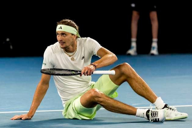 MELBOURNE, VIC - JANUARY 26: Alexander Zverev of Germany falls to the ground after a period of play during the semifinals of the 2024 Australian Open on January 26 2024, at Melbourne Park in Melbourne, Australia. (Photo by Jason Heidrich Icon Sportswire) TENNIS: JAN 26 Australian Open EDITORIAL USE ONLY Icon240126208