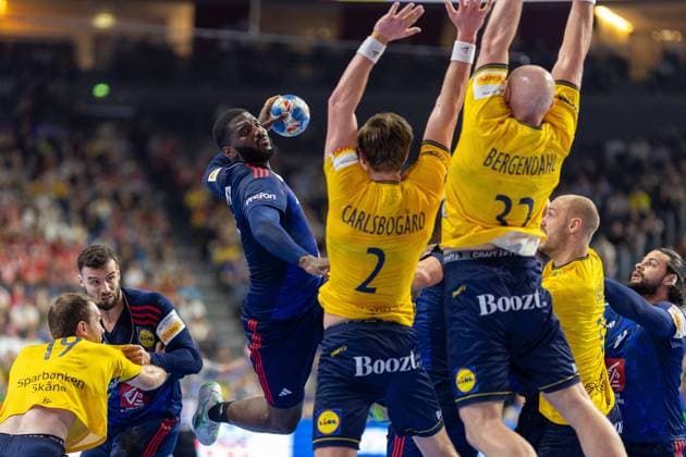 Handball I Men I Euro 2024 I Semi-final 1 I France Sweden I 26 01 2024 Dika Mem 11, France Jump shot Jonathan Carlsbogard 2, Sweden and Oscar Bergendahl 32, Sweden in defense Cologne Lanxess Arena NRW Germany Copyright: xLobeca PatrickxSuephkex
