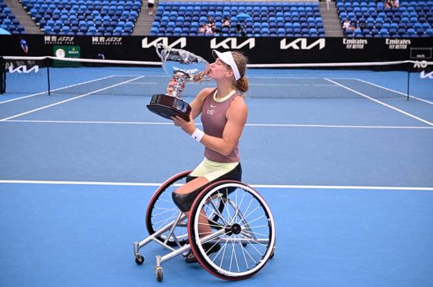 TENNIS AUSTRALIAN OPEN, Diede De Groot of Netherlands kisses the winners trophy after defeating Yui Kamiji of Japan in the women?s wheelchair singles final on Day 14 of the 2024 Australian Open at Melbourne Park in Melbourne, Saturday, January 27, 2024. ( NO ARCHIVING, EDITORIAL USE ONLY, NO USE IN BOOKS WITHOUT CONSENT MELBOURNE VICTORIA AUSTRALIA  Copyright: xJOELxCARRETTx 20240127001894159825