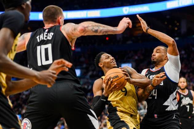 Bilder des Jahres 2024, Sport 01 Januar Sport Themen der Woche KW04 Sport Bilder des Tages January 26, 2024, Toronto, On, CANADA: Toronto Raptors guard RJ Barrett (9) goes to the basket while defended by Los Angeles Clippers guard Norman Powell (24) and centre Daniel Theis (10) during second half NBA, Basketball Herren, USA basketball action, in Toronto on Friday, January 26, 2024. Canada News - January 26, 2024  - ZUMAc35_ 20240126_zaf_c35_119 Copyright: xChristopherxKatsarovx