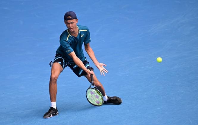 TENNIS AUSTRALIAN OPEN, Rei Sakamoto of Japan returns during the junior boys singles final against Jan Kumstat of Czech Republic on Day 14 of the 2024 Australian Open at Melbourne Park in Melbourne, Saturday, January 27, 2024. ( NO ARCHIVING, EDITORIAL USE ONLY, NO USE IN BOOKS WITHOUT CONSENT MELBOURNE VICTORIA AUSTRALIA  Copyright: xJOELxCARRETTx 20240127001894172810