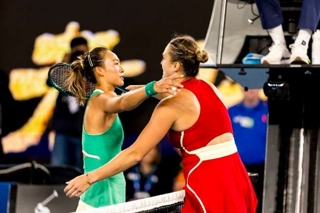 MELBOURNE, VIC - JANUARY 27: Aryna Sabalenka of Belarus meets Qinwen Zheng of China at the net after winning the finals of the 2024 Australian Open on January 27 2024, at Melbourne Park in Melbourne, Australia. (Photo by Jason Heidrich Icon Sportswire) TENNIS: JAN 27 Australian Open EDITORIAL USE ONLY Icon240127185