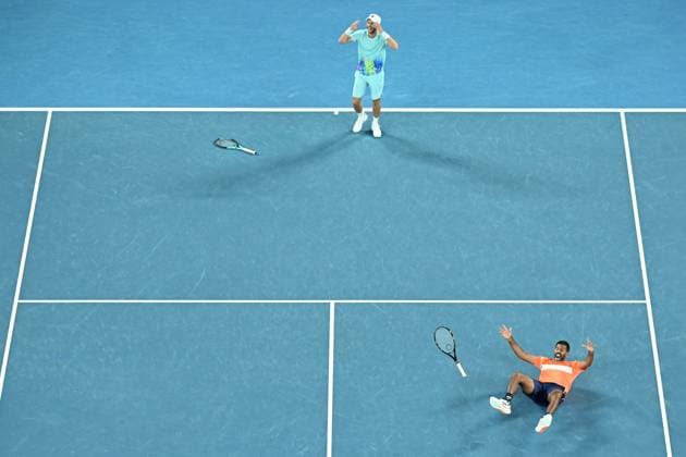 TENNIS AUSTRALIAN OPEN, Matthew Ebden (top) of Australia and Rohan Bopanna (bottom) of India celebrate match point during their Men?s Doubles final win over Simone Bolelli and Andrea Vavassori of Italy on Rod Laver Arena on Day 14 of the 2024 Australian Open at Melbourne Park in Melbourne, Thursday, January 25, 2024. ( NO ARCHIVING, EDITORIAL USE ONLY, NO USE IN BOOKS WITHOUT CONSENT MELBOURNE VICTORIA AUSTRALIA  Copyright: xJAMESxROSSx 20240127001894274081