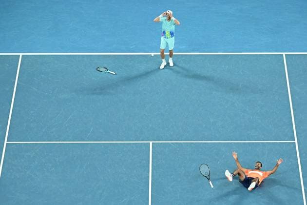 TENNIS AUSTRALIAN OPEN, Matthew Ebden (top) of Australia and Rohan Bopanna (bottom) of India celebrate match point during their Men?s Doubles final win over Simone Bolelli and Andrea Vavassori of Italy on Rod Laver Arena on Day 14 of the 2024 Australian Open at Melbourne Park in Melbourne, Thursday, January 25, 2024. ( NO ARCHIVING, EDITORIAL USE ONLY, NO USE IN BOOKS WITHOUT CONSENT MELBOURNE VICTORIA AUSTRALIA  Copyright: xJAMESxROSSx 20240127001894274693