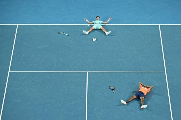 TENNIS AUSTRALIAN OPEN, Matthew Ebden (top) of Australia and Rohan Bopanna (bottom) of India celebrate match point during their Men?s Doubles final win over Simone Bolelli and Andrea Vavassori of Italy on Rod Laver Arena on Day 14 of the 2024 Australian Open at Melbourne Park in Melbourne, Thursday, January 25, 2024. ( NO ARCHIVING, EDITORIAL USE ONLY, NO USE IN BOOKS WITHOUT CONSENT MELBOURNE VICTORIA AUSTRALIA  Copyright: xJAMESxROSSx 20240127001894275837
