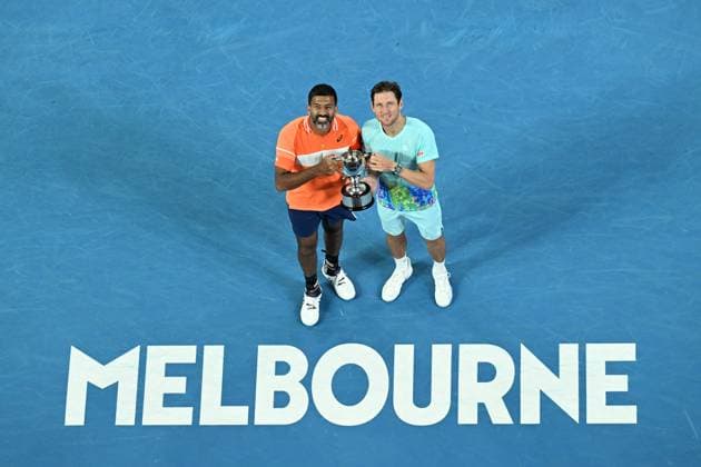 TENNIS AUSTRALIAN OPEN, Matthew Ebden (right) of Australia and Rohan Bopanna (left) of India pose for photographs with the Men?s Doubles Trophy following their finals win over Simone Bolelli and Andrea Vavassori of Italy on Rod Laver Arena on Day 14 of the 2024 Australian Open at Melbourne Park in Melbourne, Thursday, January 25, 2024. ( NO ARCHIVING, EDITORIAL USE ONLY, NO USE IN BOOKS WITHOUT CONSENT MELBOURNE VICTORIA AUSTRALIA  Copyright: xJAMESxROSSx 20240127001894280582
