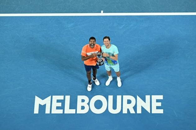 TENNIS AUSTRALIAN OPEN, Matthew Ebden (right) of Australia and Rohan Bopanna (left) of India pose for photographs with the Men?s Doubles Trophy following their finals win over Simone Bolelli and Andrea Vavassori of Italy on Rod Laver Arena on Day 14 of the 2024 Australian Open at Melbourne Park in Melbourne, Thursday, January 25, 2024. ( NO ARCHIVING, EDITORIAL USE ONLY, NO USE IN BOOKS WITHOUT CONSENT MELBOURNE VICTORIA AUSTRALIA  Copyright: xJAMESxROSSx 20240127001894281782