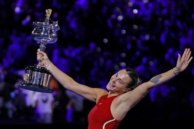 27th January 2024; Melbourne Park, Melbourne, Victoria, Australia; Australian Open Tennis Championship, Ladies singles final on Day 14; Aryna Sabalenka lifts the trophy after after winning the singles finals against Qinwen Zheng (CHN)  ActionPlus12602637 NaFoto