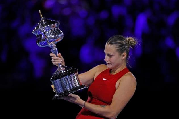 27th January 2024; Melbourne Park, Melbourne, Victoria, Australia; Australian Open Tennis Championship, Ladies singles final on Day 14; Aryna Sabalenka lifts the trophy after winning the singles finals against Qinwen Zheng (CHN)  ActionPlus12602633 NaFoto