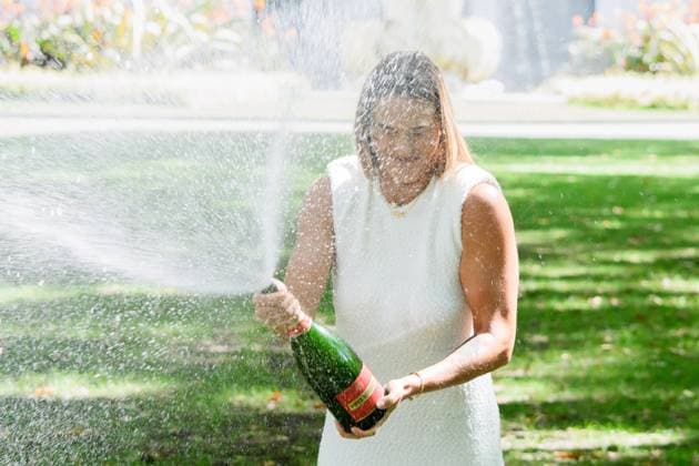 January 28, 2024: ARYNA SABALENKA of Belarus sprays champagne at her trophy photo call in Carlton Gardens after winning the WomenÃ¢â‚¬â ¢s Singles Final of the 2024 Australian Open in Melbourne Australia. Cal Media USA - ZUMAc04_ 20240128_faf_c04_001 Copyright: xSydneyxLowx