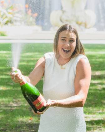 January 28, 2024: ARYNA SABALENKA of Belarus sprays champagne at her trophy photo call in Carlton Gardens after winning the WomenÃ¢â‚¬â ¢s Singles Final of the 2024 Australian Open in Melbourne Australia. Cal Media USA - ZUMAc04_ 20240128_faf_c04_003 Copyright: xSydneyxLowx