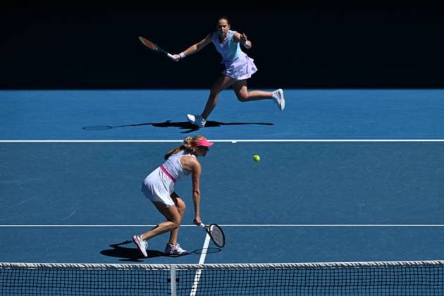 TENNIS AUSTRALIAN OPEN, Lyudmyla Kichenok (bottom) of Ukraine and Jelena Ostapemko (top) of Latvia in action during the Women?s Doubles final against Su-Wei Hsieh of Chinese Taipei and Elise Mertens of Belgium on Rod Laver Arena on Day 15 of the 2024 Australian Open at Melbourne Park in Melbourne, Thursday, January 25, 2024. ( NO ARCHIVING, EDITORIAL USE ONLY, NO USE IN BOOKS WITHOUT CONSENT MELBOURNE VICTORIA AUSTRALIA  Copyright: xJAMESxROSSx 20240128001894656061