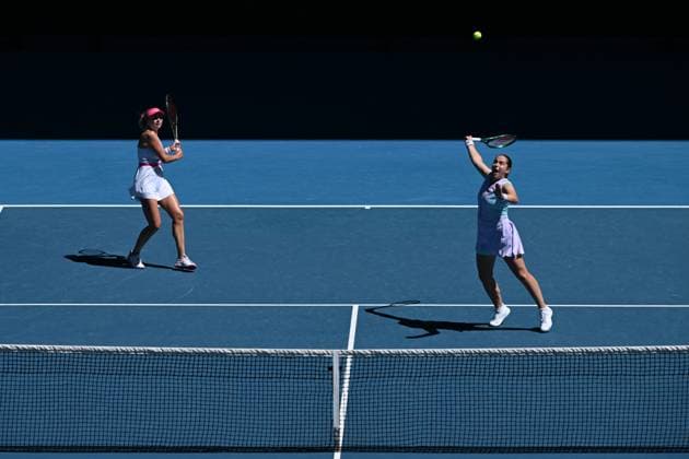 TENNIS AUSTRALIAN OPEN, Lyudmyla Kichenok (left) of Ukraine and Jelena Ostapenko (right)of Latvia in action during the Women?s Doubles final against Su-Wei Hsieh of Chinese Taipei and Elise Mertens of Belgium on Rod Laver Arena on Day 15 of the 2024 Australian Open at Melbourne Park in Melbourne, Thursday, January 25, 2024. ( NO ARCHIVING, EDITORIAL USE ONLY, NO USE IN BOOKS WITHOUT CONSENT MELBOURNE VICTORIA AUSTRALIA  Copyright: xJAMESxROSSx 20240128001894658910