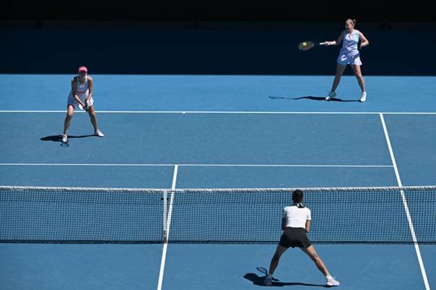 TENNIS AUSTRALIAN OPEN, Lyudmyla Kichenok (left) of Ukraine and Jelena Ostapenko (right)of Latvia in action during the Women?s Doubles final against Su-Wei Hsieh (bottom) of Chinese Taipei and Elise Mertens of Belgium on Rod Laver Arena on Day 15 of the 2024 Australian Open at Melbourne Park in Melbourne, Thursday, January 25, 2024. ( NO ARCHIVING, EDITORIAL USE ONLY, NO USE IN BOOKS WITHOUT CONSENT MELBOURNE VICTORIA AUSTRALIA  Copyright: xJAMESxROSSx 20240128001894661687
