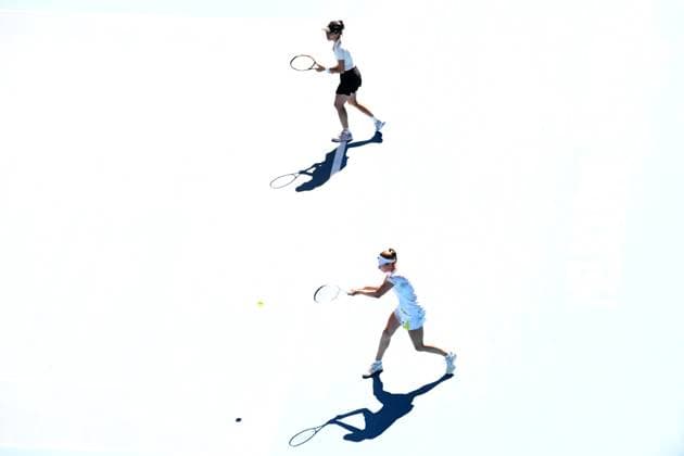 TENNIS AUSTRALIAN OPEN, Su-Wei Hsieh (top) of Chinese Taipei and Elise Mertens (bottom) of Belgium in action during the Women?s Doubles final against Lyudmyla Kichenok of Ukraine and Jelena Ostapemko of Latvia on Rod Laver Arena on Day 15 of the 2024 Australian Open at Melbourne Park in Melbourne, Thursday, January 25, 2024. ( NO ARCHIVING, EDITORIAL USE ONLY, NO USE IN BOOKS WITHOUT CONSENT MELBOURNE VICTORIA AUSTRALIA  Copyright: xJAMESxROSSx 20240128001894671851