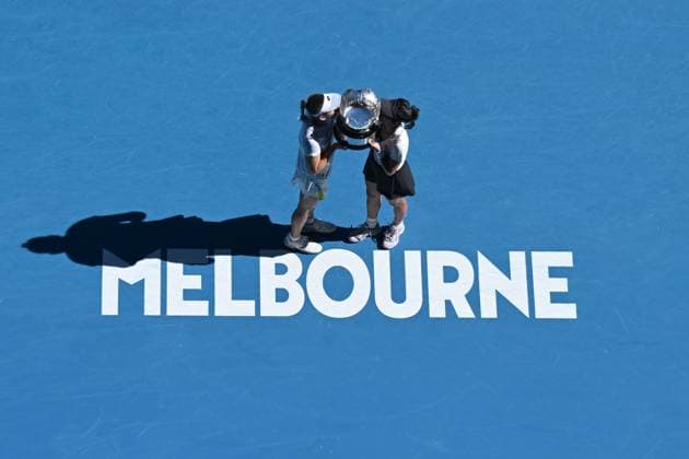 TENNIS AUSTRALIAN OPEN, Su-Wei Hsieh (right) of Chinese Taipei and Elise Mertens (left) of Belgium pose for photos with the winners trophy following the Women?s Doubles final against Lyudmyla Kichenok of Ukraine and Jelena Ostapemko of Latvia on Rod Laver Arena on Day 15 of the 2024 Australian Open at Melbourne Park in Melbourne, Thursday, January 25, 2024. ( NO ARCHIVING, EDITORIAL USE ONLY, NO USE IN BOOKS WITHOUT CONSENT MELBOURNE VICTORIA AUSTRALIA  Copyright: xJAMESxROSSx 20240128001894681558