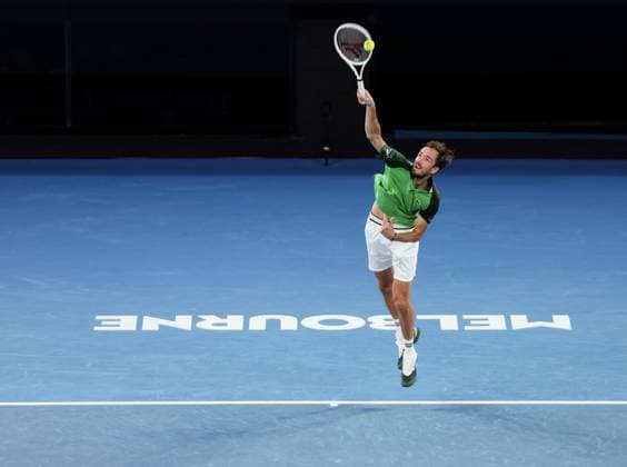 (240128) -- MELBOURNE, Jan. 28, 2024 Daniil Medvedev serves during the men s singles final between Jannik Sinner of Italy and Daniil Medvedev of Russia at Australian Open tennis tournament in Melbourne, Australia, Jan. 28, 2024. ) (SP)AUSTRALIA-MELBOURNE-TENNIS-AUSTRALIAN OPEN-FINAL MaxPing 
