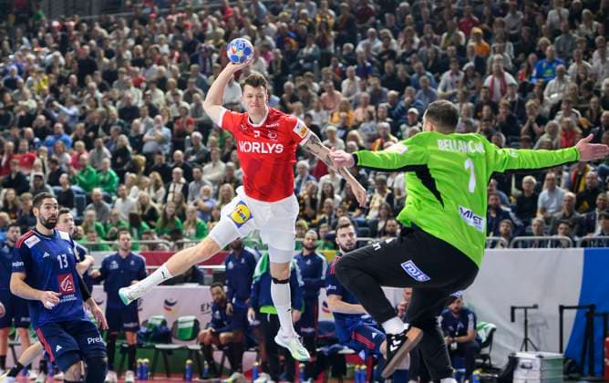from l Emil JAKOBSEN DEN , goalkeeper BELLAHCENE Samir FRA , action, duel, throw, France FRA vs Denmark DEN , final, in Cologne on 28 01 2024 European Mens Handball Championship, from 10 01 28 01 2024 in Germany Germany