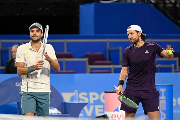 MONTPELLIER, FRANCE - JANUARY 29 : Gregoire BARRERE (FRA) and Lucas POUILLE (FRA), winners, during the doubles 1st round of the ATP, Tennis Herren 250 Open Sud de France tournament in Montpellier, France on January 29th, 2024. TENNIS : Open Sud de France ATP 250 - 29 01 2024 ValentinaClaret Panoramic 