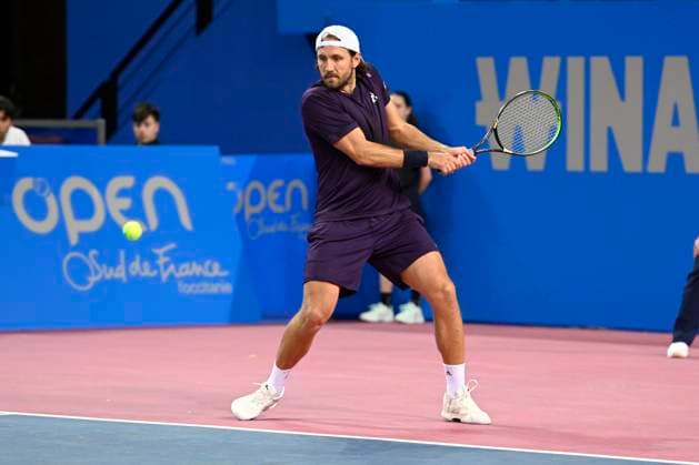 MONTPELLIER, FRANCE - JANUARY 29 : Lucas POUILLE (FRA) during the 1st round of the ATP, Tennis Herren 250 Open Sud de France tournament in Montpellier, France on January 29th, 2024. TENNIS : Open Sud de France ATP 250 - 29 01 2024 ValentinaClaret Panoramic 