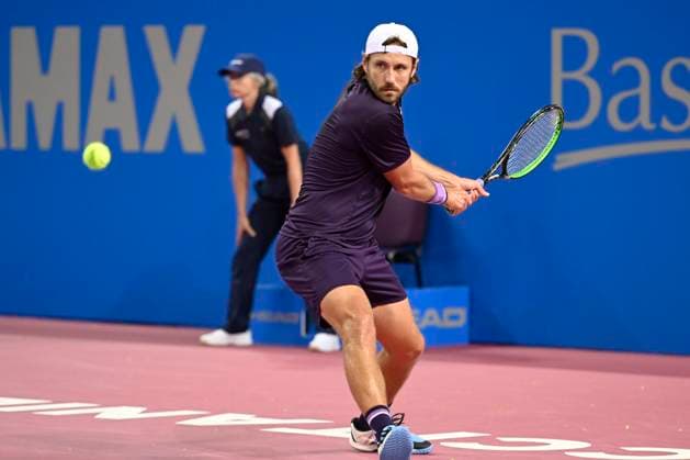 MONTPELLIER, FRANCE - JANUARY 30 : Lucas POUILLE (FRA) during the 1st round of the ATP, Tennis Herren 250 Open Sud de France tournament vs. Harold MAYOT (FRA) in Montpellier, France on January 30th, 2024. TENNIS : Open Sud de France ATP 250 - 30 01 2024 ValentinaClaret Panoramic 