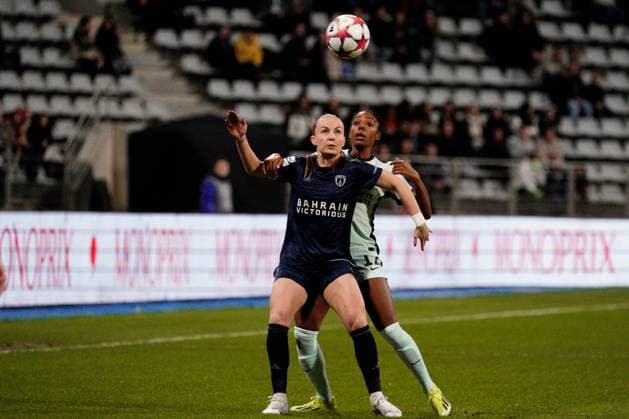 Julie Dufour of Paris FC and Ashley Lawrence of Chelsea Paris FC Feminines v Chelsea Women, Football, UEFA Women s Champions League, Group D, Stade Charlety, Paris, France - 30 Jan 2024 EDITORIAL USE ONLY No use with unauthorised audio, video, data, fixture lists, club league logos or live services. Online in-match use limited to 120 images, no video emulation. No use in betting, games or single club league player publications. Copyright: xDavexWinter Shutterstockx 14324140af
