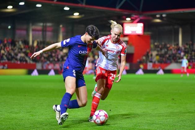 Elisa De Almeida 5 Paris and Pernille Harder 21 Bayern in action at the UEFA Womens Champions League match FC Bayern Munich Paris Saint Germain Feminine on 30 01 2024 Munich FC Bayern Campus Bayern Germany
