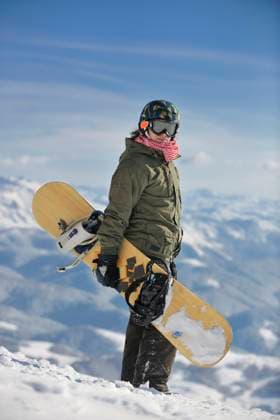 snowboarder portrait snowboarder relaxing and posing at sunny day on winter season with blue sky in background (License=RF) 3726443 ,model released, Symbolfoto Copyright: xZoonar.com benisxarapovicx 3726443 ,model released, Symbolfoto ,property released