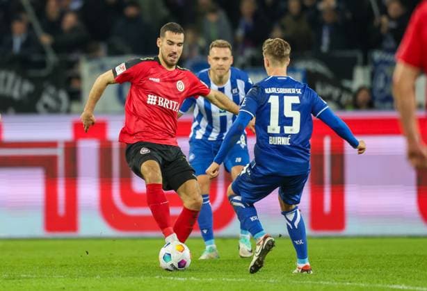 Soccer 2 BL Karlsruher SC SV Wehen Wiesbaden 02 02 24, Ivan Prtajin SVWW , Dzenis Burnic KSC ,