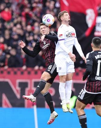 03 02 2024 Soccer Season 2023 2024 2 Soccer Bundesliga 20 Matchday 1 FC Nürnberg FCN Club VfL Osnabrück Sportfoto Zink DaMa xdaxmax DFL regulations prohibit any use of photographs as image sequences and or quasi video only for editorial use Florian Flick 6, 1 FC Nürnberg FCN in header duel with Michael Cuisance 27, VfL Osnabrück