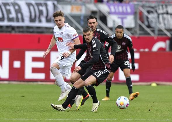 03 02 2024 Soccer Season 2023 2024 2 Soccer Bundesliga 20 Matchday 1 FC Nürnberg FCN Club VfL Osnabrück Sportfoto Zink DaMa xdaxmax DFL regulations prohibit any use of photographs as image sequences and or quasi video only for editorial use Erik Engelhardt 9, VfL Osnabrück Erik Wekesser 13, 1 FC Nürnberg FCN Ivan Marquez 15, 1 FC Nürnberg FCN