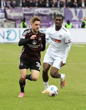 03 02 2024 Soccer Season 2023 2024 2 Soccer Bundesliga 20 Matchday 1 FC Nürnberg FCN Club VfL Osnabrück Sportfoto Zink DaMa xdaxmax DFL regulations prohibit any use of photographs as image sequences and or quasi video only for editorial use Lukas Schleimer 36, 1 FC Nürnberg FCN Kwasi Okeyere Wriedt 10, VfL Osnabrück