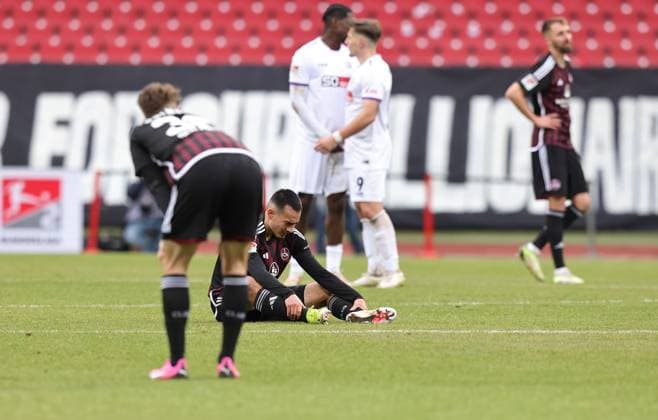 03 02 2024 Soccer Season 2023 2024 2 Soccer Bundesliga 20 Matchday 1 FC Nürnberg FCN Club VfL Osnabrück Sportfoto Zink DaMa xdaxmax DFL regulations prohibit any use of photographs as image sequences and or quasi video only for editorial use Lukas Schleimer 36, 1 FC Nürnberg FCN Jens Castrop 17, 1 FC Nürnberg FCN Florian Hübner Huebner 19, 1 FC Nürnberg FCN disappointed Disappointment after the end of the match