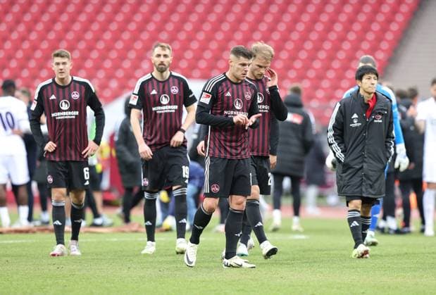 03 02 2024 Soccer Season 2023 2024 2 Soccer Bundesliga 20 Matchday 1 FC Nürnberg FCN Club VfL Osnabrück Sportfoto Zink DaMa xdaxmax DFL regulations prohibit any use of photographs as image sequences and or quasi video only for editorial use Team Team of FCN disappointed Disappointment after the end of the match