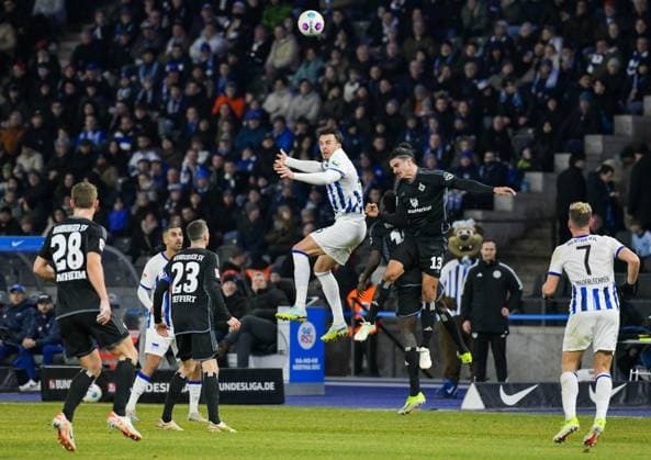 Soccer 2 Bundesliga, Hertha BSC Hamburger SV 03 02 2024, xdanx, Soccer 2 Bundesliga, Hertha BSC Hamburger SV, v l Jonas Meffert Hamburger SV 23 ,Haris Tabakovic Hertha BSC 25 ,Guilherme Ramos Hamburger SV 13 ,Florian Niederlechner Hertha BSC 7 ,duel, duel, fight, tackle DFL DFB REGULATIONS PROHIBIT ANY USE OF PHOTOGRAPHS as IMAGE SEQUENCES and or QUASI VIDEO Foto Daniel Lakomski Mix1 Berlin Olympiastadion Berlin Berlin Germany EN Copyright: xDanielxLakomskix