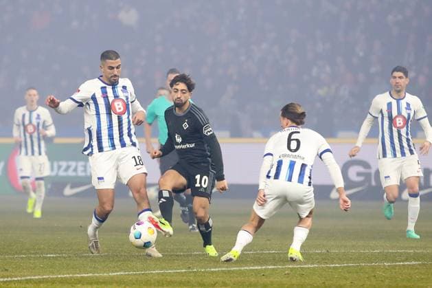 03 02 2024, xtgx, Football 2 Bundesliga, Hertha BSC Berlin Hamburger SV emspor, v l Wilfried Kanga Hertha, 18 , Immanuel Pherai HSV, 10 duel, duel, fight, tackle DFL DFB REGULATIONS PROHIBIT ANY USE OF PHOTOGRAPHS as IMAGE SEQUENCES and or QUASI VIDEO Berlin
