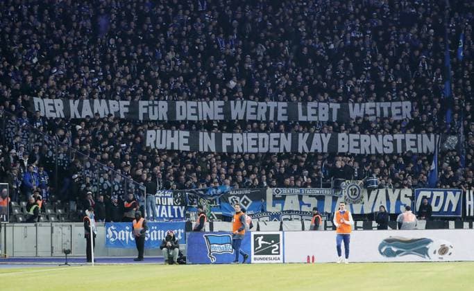 HSV fans with banner The fight for your values lives on rest in peace Kay Berstein Sport Soccer Football DFL 2 Bundesliga Men 20 Matchday Season 2023 2024 03 02 2024 Hertha BSC Berlin vs Hamburger SV HSV DFL regulations prohibit any use of photographs as image sequences and or quasi video