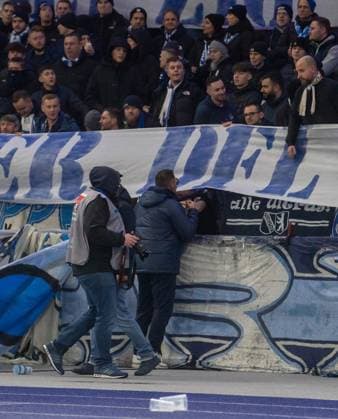 Soccer, Men, Season 2023 2024, 2 Bundesliga 20 Matchday , Hertha BSC Hamburger SV, Fans of Hertha protest against the potential investor of the DFL with tennis balls, the game is interrupted, Coach Pal Dardai Hertha BSC in the Ostkurve to talk to Ultras, 03 02 2024, Copyright: xSebastianxRäppold MatthiasxKochx