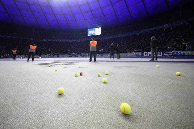 03 02 2024, xtgx, Soccer 2 Bundesliga, Hertha BSC Berlin Hamburger SV emspor, v l symbol photo, symbol image tennis balls lying on the ground, they were thrown due to protests against the DFL DFL DFB REGULATIONS PROHIBIT ANY USE OF PHOTOGRAPHS as IMAGE SEQUENCES and or QUASI VIDEO Berlin