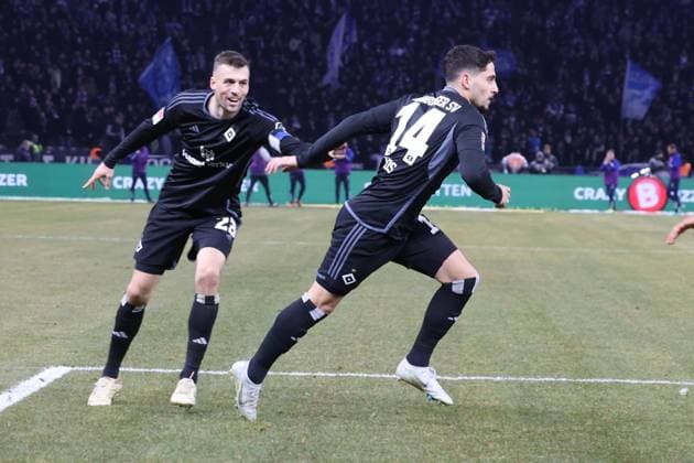 DEU, DFL, 2 FBL, Hertha BSC vs Hamburger SV, 03 02 2024, Berliner Olympiastadion, Berlin, DEU, DFL, 2 FBL, Hertha BSC vs Hamburger SV, im Bild 1 2 durch Ludovit Reis Hamburger SV 14 , Jonas Meffert Hamburger SV 23 DFL regulations prohibit any use of Photographs as image sequences and or quasi video Foto Juergen Engler nordphoto GmbH nordphotoxGmbHx xEngler nph00076