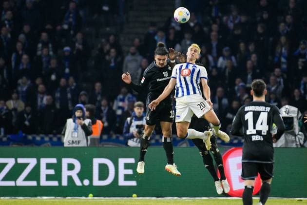Soccer 2 Bundesliga, Hertha BSC Hamburger SV 03 02 2024, xdanx, Soccer 2 Bundesliga, Hertha BSC Hamburger SV, v l Guilherme Ramos Hamburger SV 13 ,Marc Oliver Kempf Hertha BSC 20 ,Zweikampf, Duell, Kampf, tackle DFL DFB REGULATIONS PROHIBIT ANY USE OF PHOTOGRAPHS as IMAGE SEQUENCES and or QUASI VIDEO Foto Daniel Lakomski Mix1 Berlin Olympiastadion Berlin Berlin Germany EN Copyright: xDanielxLakomskix