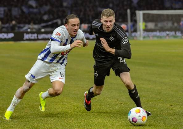 Soccer 2 Bundesliga, Hertha BSC Hamburger SV 03 02 2024, xdanx, Soccer 2 Bundesliga, Hertha BSC Hamburger SV, v l Michal Karbownik Hertha BSC 6 ,Ignace Van Der Brempt Hamburger SV 22 ,Zweikampf, Duell, Kampf, tackle DFL DFB REGULATIONS PROHIBIT ANY USE OF PHOTOGRAPHS as IMAGE SEQUENCES and or QUASI VIDEO Foto Daniel Lakomski Mix1 Berlin Olympiastadion Berlin Berlin Germany EN Copyright: xDanielxLakomskix