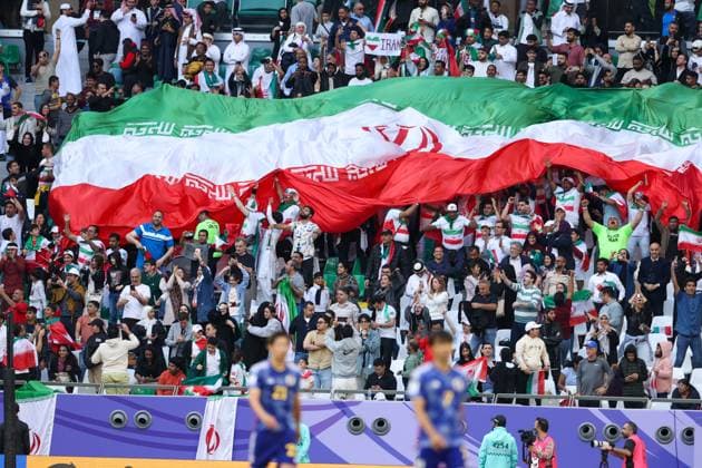 AL RAYYAN, QATAR - FEBRUARY 03: Fans of Iran cheer up during the AFC Asian Cup Qatar 2023 Quarter-final match between Iran and Japan at Education City Stadium on February 3, 2024 in Al Rayyan, Qatar.  Copyright: xVCGx 111478046258
