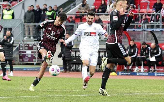 03 02 2024 Soccer Season 2023 2024 2 Soccer Bundesliga 20 Matchday 1 FC Nürnberg FCN Club VfL Osnabrück Sportfoto Zink DaMa xdaxmax DFL regulations prohibit any use of photographs as image sequences and or quasi video only for editorial use Can Yilmaz Uzun 42, 1 FC Nürnberg FCN with shot on goal