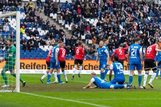 The 1 0 for Hannover 96 by the own goal of Kevin Schumacher FC Hansa Rostock, 13 GER, Hannover 96 vs FC Hansa Rostock, Football, 2 Bundesliga, Matchday 20, Season 2023 2024, 04 02 2024 DFL REGULATIONS PROHIBIT ANY USE OF PHOTOGRAPHS AS IMAGE SEQUENCES AND OR QUASI VIDEO Hannover 96 vs FC Hansa Rostock, Football, 2 Bundesliga, Matchday 20, Season 2023 2024, 04 02 2024 Hannover Copyright: xEibner-Pressefoto FabioxDeinertx EP_FDT